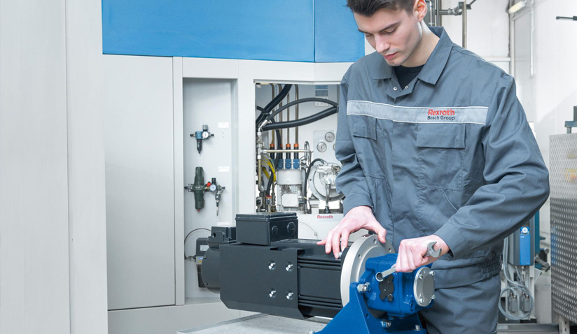 A skilled technician performs precise work on hydraulic equipment, showcasing the expertise available from a reliable hydraulic equipment supplier for hydraulic repair service near me, including essential hydraulic fittings.