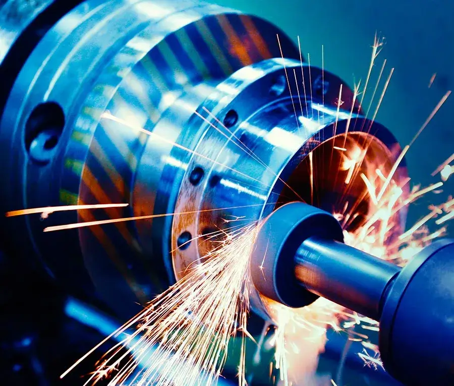 Close-up shot of metal machining with sparks, perfect for heavy equipment spare parts and construction machinery spare parts suppliers, highlighting the quality of construction equipment spare parts.